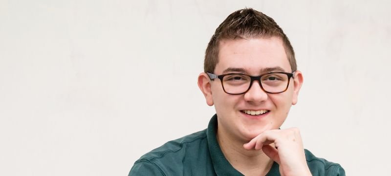 male NWC student with glasses