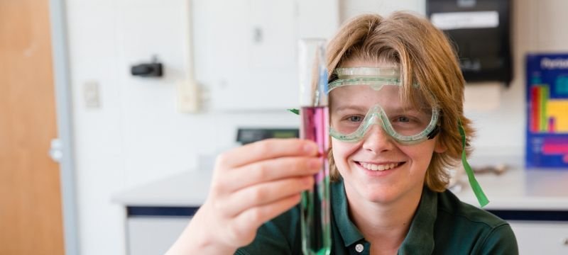 NWC student wearing safety goggles in science class