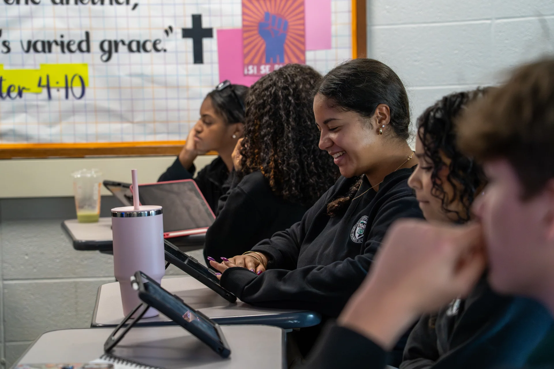 NWC seniors in college shirts
