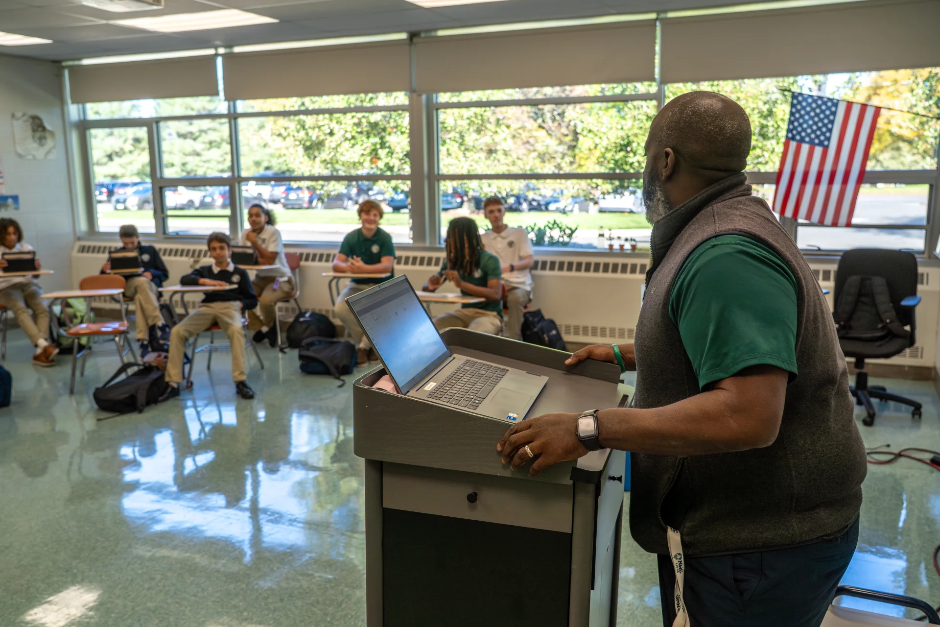 female and male NWC students writing on whiteboard